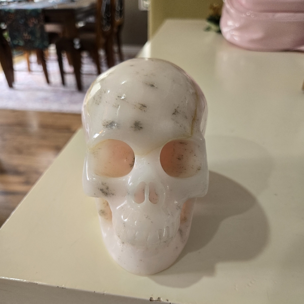 Pink Aragonite Carved Crystal Skull. Stands 4" high & weighs 2.10 lbs.